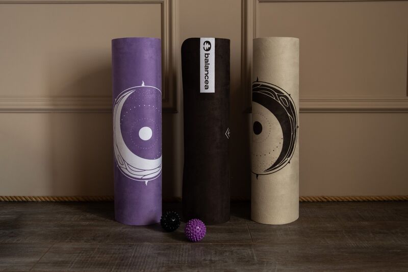 Three rolled mats